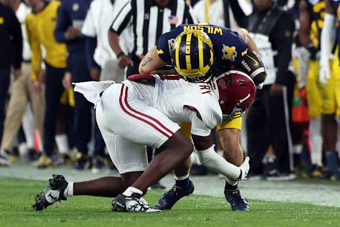 Jan 1, 2024; Pasadena, CA, USA; Alabama Crimson Tide defensive back Kool-Aid McKinstry (1) tackles Michigan Wolverines wide receiver Roman Wilson (1) in the fourth quarter in the 2024 Rose Bowl college football playoff semifinal game at Rose Bowl. Mandatory Credit: Kiyoshi Mio-USA TODAY Sports  